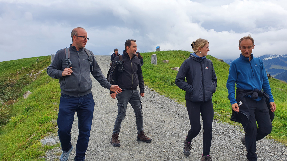 Tapkey team hiking in the mountains